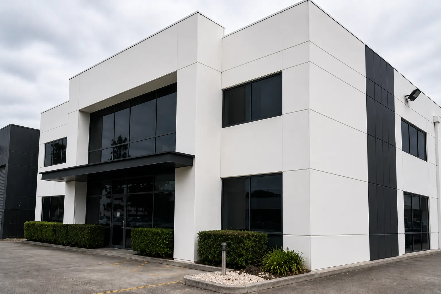 Clean rendered waterfront facade in Double Bay